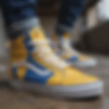 Close-up view of the materials used in blue and yellow Vans high tops