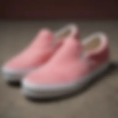Texture and Color of Pink Suede Slip-On Vans Close-up of pink suede slip-on Vans showcasing texture and color