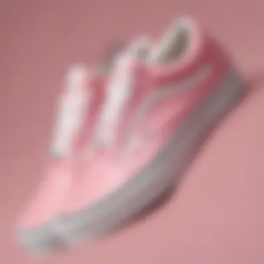 Close-up of Pink and White Old Skool Vans showcasing their unique design details