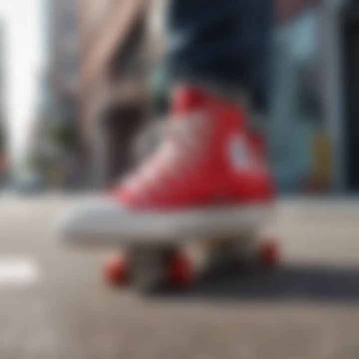 A close-up shot of red low top Chucks on a skateboard