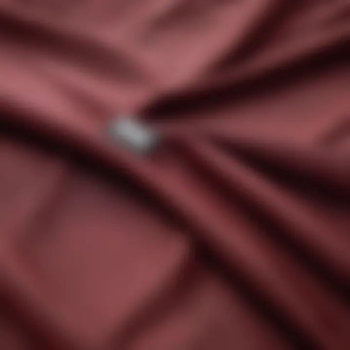 Close-up of the fabric texture of the Vans Burgundy Windbreaker