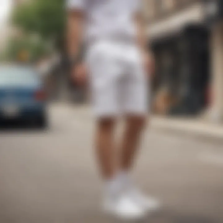 Stylish street fashion featuring white Dickies shorts paired with sneakers