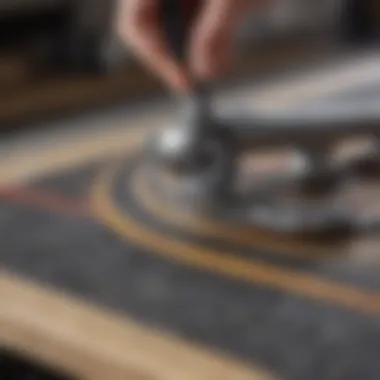 Close-up of skateboard bearings being cleaned with a specialized tool.