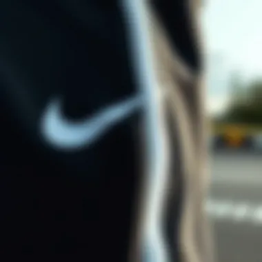 Close-up view of the fabric texture of Nike Tech Fleece Taped Jogger Pants