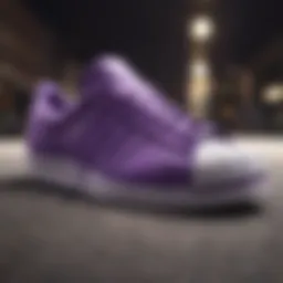 A close-up view of the Purple Shell Toe Adidas showcasing its unique design features.