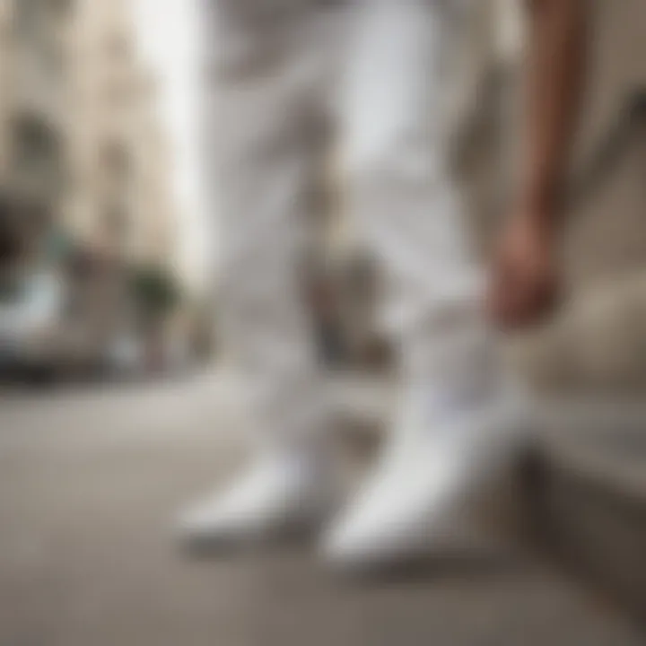 A group of skateboarders wearing white on white slip-on Vans in an urban setting